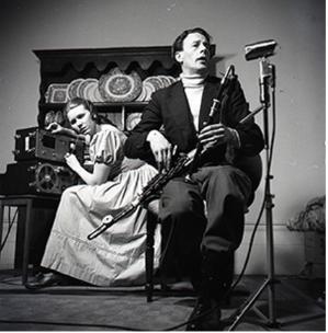 Photograph of Jean Ritchie recording Seamus Ennis playing the uilleann pipes, 1952, from Ritchie-Pickow Archive